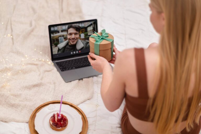 Cheers over a laptop video call